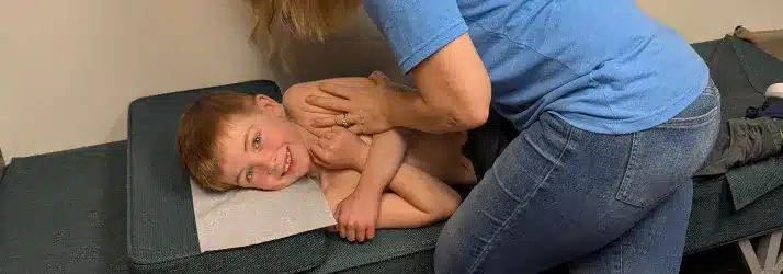 Your Child’s 2-Minute Adjustment in Dubuque IA Is Doing More Than You Think